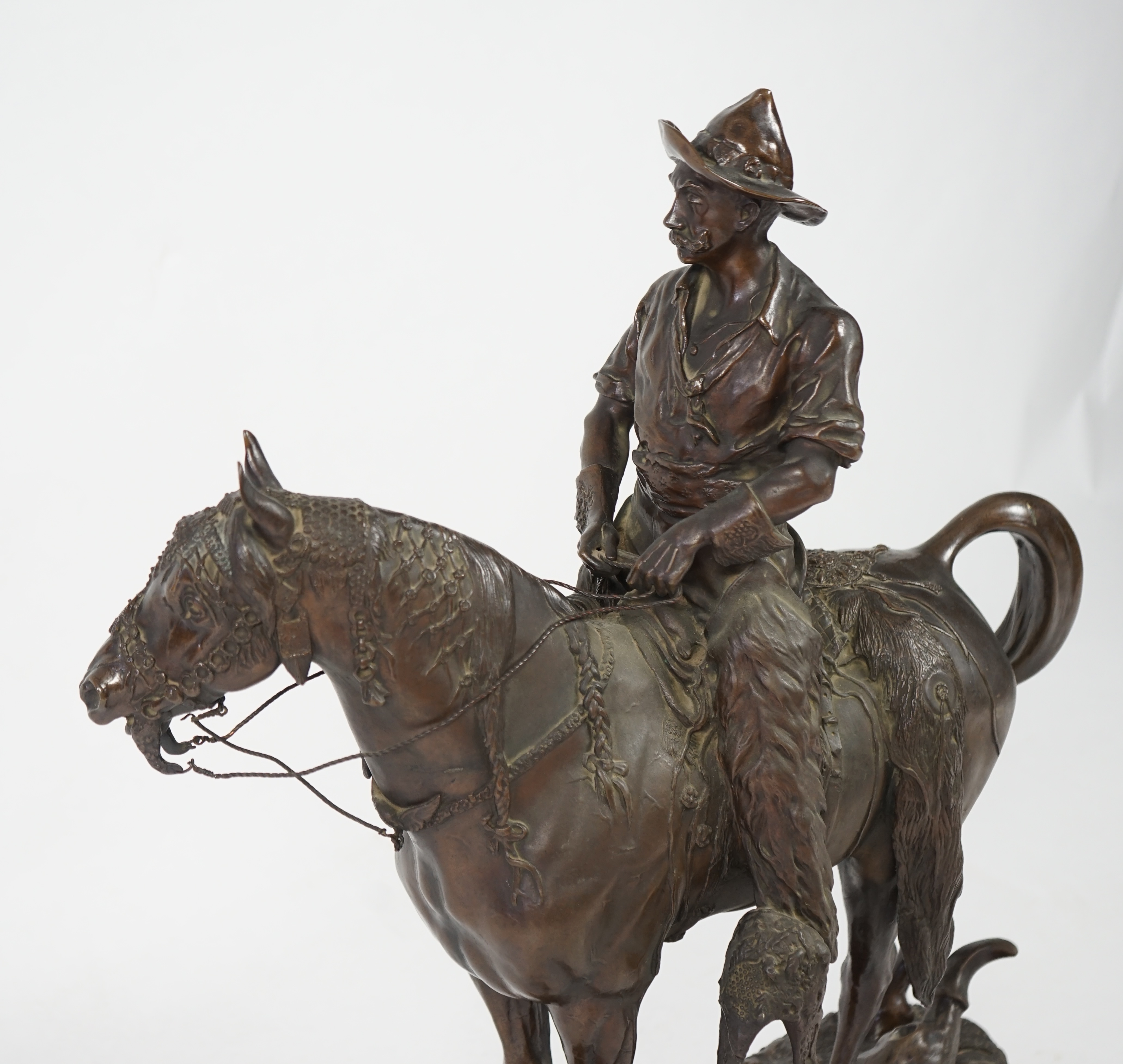 Walter Winans (St. Petersburg, 1852-Parsloe Park, Essex, 1920), a cast bronze of the artist, as a cowboy, riding the Arab stallion Skowronek, 50cm wide, 66cm high, overall 79.5cm high